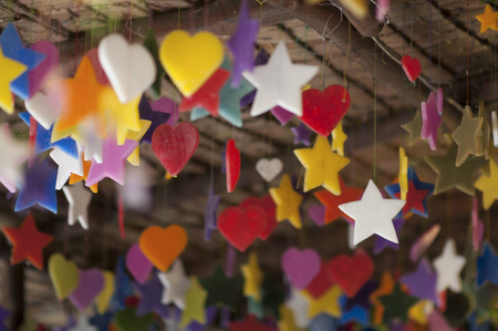 Candles in various shapes and colors are hung to decorate the ceiling.の写真素材