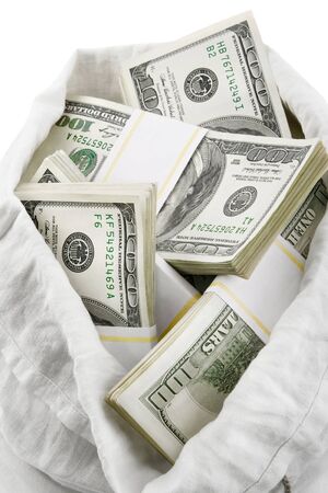 open sack full of money dollars isolated on white backgroundの写真素材