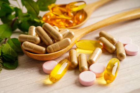 Alternative medicine herbal organic capsule with vitamin E omega 3 fish oil, mineral, drug with herbs leaf natural supplements for healthy good life.の写真素材