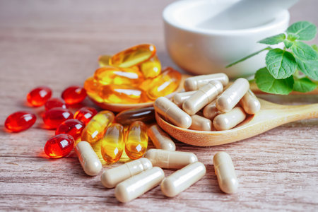 Alternative medicine herbal organic capsule with vitamin E omega 3 fish oil, mineral, drug with herbs leaf natural supplements for healthy good life.の写真素材