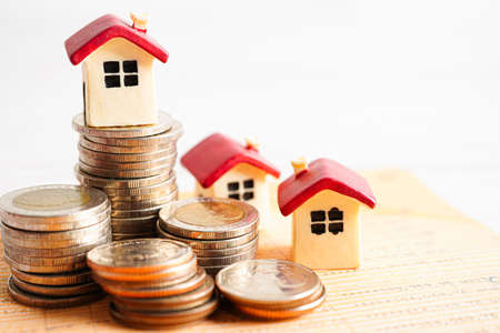 House on stack of coins, Investment property finance concept.の写真素材