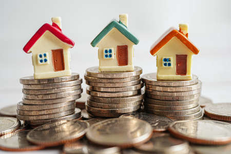 House on stack of coins, Investment property finance concept.の写真素材