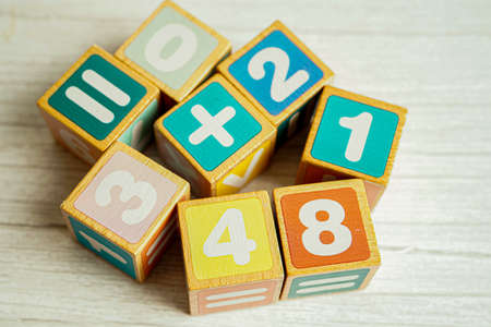 Number wood block cubes for learning Mathematic, education math concept.の写真素材