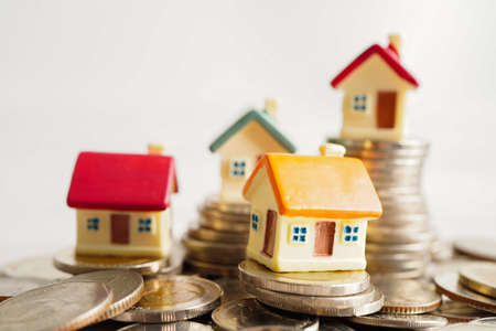 House on stack of coins, Investment property finance concept.の写真素材