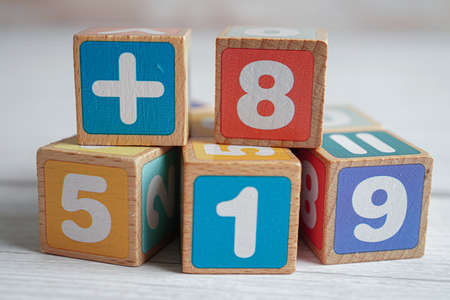 Number wood block cubes for learning Mathematic, education math concept.の写真素材