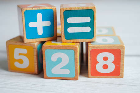 Number wood block cubes for learning Mathematic, education math concept.の写真素材