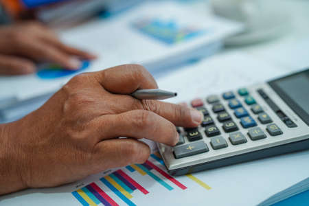 Pen on chart or graph paper. Financial, account, statistics and business data concept.の写真素材