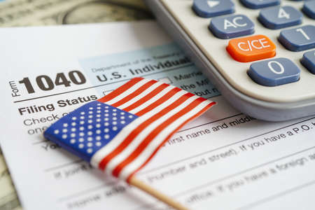 Tax form 1040 U.S. Individual Income Tax Return, business finance concept.の写真素材
