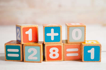Number wood block cubes for learning Mathematic, education math concept.の写真素材