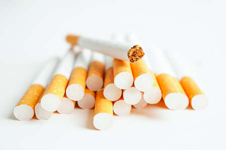 Cigarette isolated on white background, roll tobacco in paper with filter tube, No smoking concept.