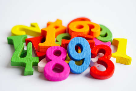 Number wood block cubes for learning Mathematic, education math concept.