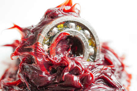 Grease and ball bearing, red excellent water resistance synthetic lithium complex grease for moving path and machinery lubrication for automotive and industrial.の写真素材