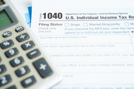 Tax form 1040 U.S. Individual Income Tax Return, business finance concept.の写真素材