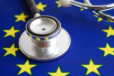Black stethoscope on EU flag background, Business and finance concept.の写真素材