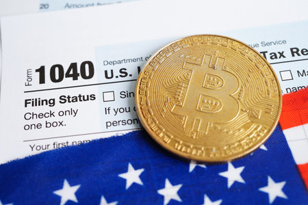 Tax form 1040 U.S. Individual Income Tax Return and bitcoin, business finance, Digital currency, Virtual cryptocurrency concept.の写真素材