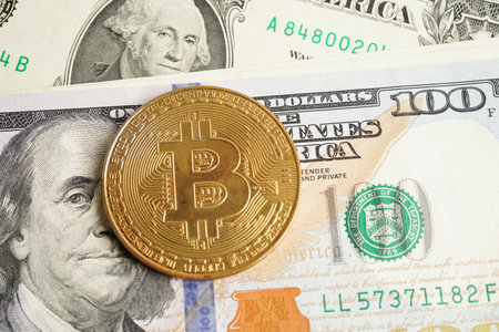Golden bitcoin on US dollar banknotes money for business and commercial, Digital currency, Virtual cryptocurrency, blockchain technology.の写真素材