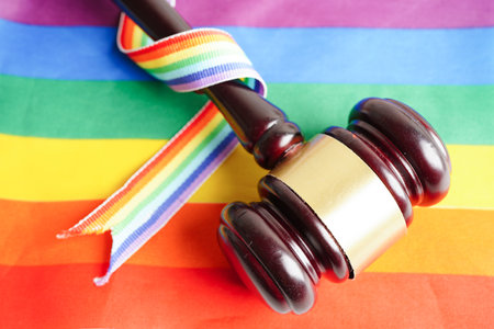 Asian woman with rainbow flag, LGBT symbol rights and gender equality, LGBT Pride Month in June.の写真素材
