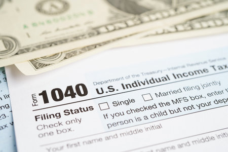 Tax form 1040 U.S. Individual Income Tax Return, business finance concept.の写真素材