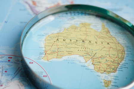 Bangkok, Thailand - May 15, 2022 Magnifying glass on world map.のeditorial素材