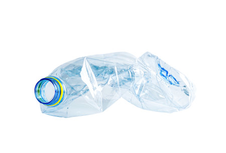 Plastic water bottle with empty crumpled used isolated on white background with clipping path,...