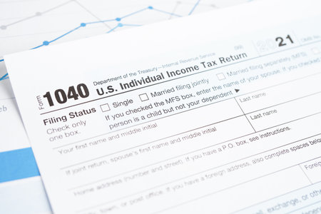 Tax form 1040 U.S. Individual Income Tax Return, business finance concept.