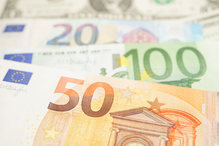 Euro and US dollar banknote cash money, finance economic banking business exchange market concept.の写真素材