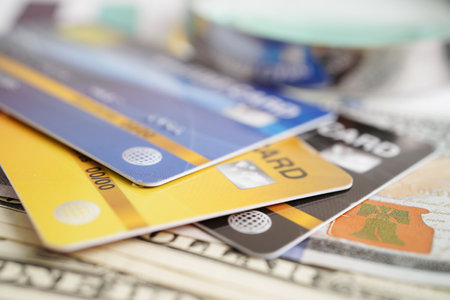 Credit card with password key lock and US dollar banknote money, security finance business concept.の写真素材