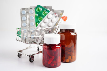 Shopping trolley with blister pill and capsule from drug prescription, pharmacy for treatment health medicine.の写真素材