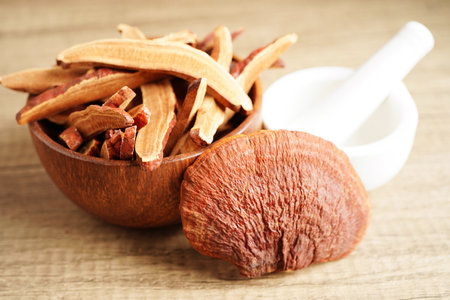 Lingzhi or Reishi mushroom with capsules, organic natural healthy food.