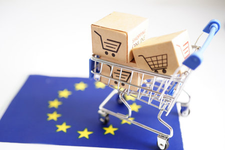 Online shopping, Shopping cart box on EU European Union flag, import export, finance commerce.の写真素材