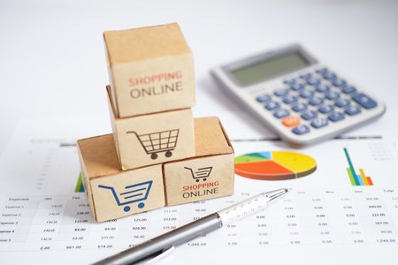 Online shopping, Shopping cart box on business graph, import export, finance commerce.