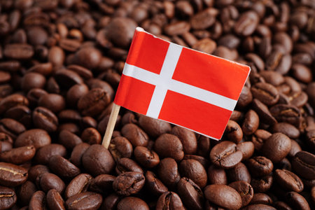 Denmark flag on coffee beans, shopping online for export or import food product.