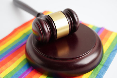 Gavel for judge lawyer on rainbow flag, symbol of LGBT pride month.の写真素材
