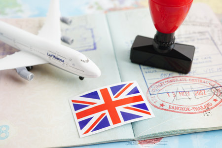 United Kingdom Visa and passport document to immigration at airport in country.のeditorial素材