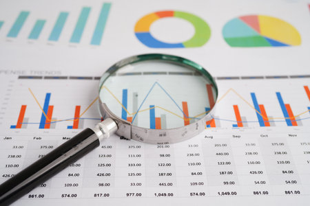 Stethoscope and US dollar banknotes on chart or graph paper, Financial, account, statistics and business data  medical health concept.の写真素材