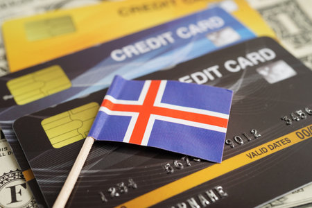 Iceland flag on credit card, finance economy trading shopping online business.の写真素材