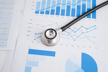 Pen on chart graph paper. Finance, account, statistic, investment data economy, stock exchange business.の写真素材
