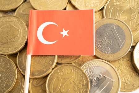 Turkey flag on coin and banknote money, finance trading investment business currency concept.の写真素材