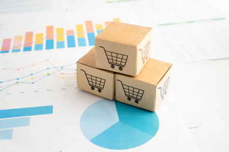 Online shopping, Shopping cart box on business graph, import export, finance commerce.