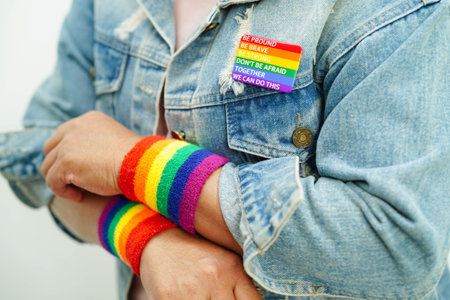 Asian woman with rainbow flag, LGBT symbol rights and gender equality, LGBT Pride Month in June.の写真素材