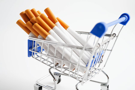 Cigarette in shopping cart, cost, trading, marketing and production, No smoking concept.の写真素材