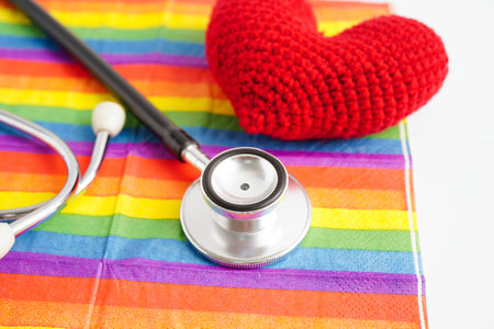LGBT symbol, Stethoscope with red heart on rainbow flag, rights and gender equality, LGBT Pride Month in June.の写真素材