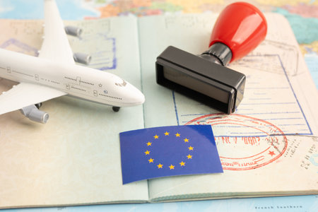 EU flag and passport with airplane for travel.の写真素材