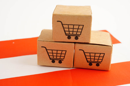 Online shopping, Shopping cart box on Austria flag, import export, finance commerce.
