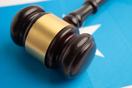 Somalia, Legal, justice and agreement, wooden court gavel on flag.の写真素材