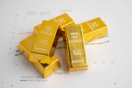 Gold bar on graph, economy finance exchange trade investment.の写真素材