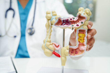 Asian woman with thyroid gland human anatomy model.の写真素材