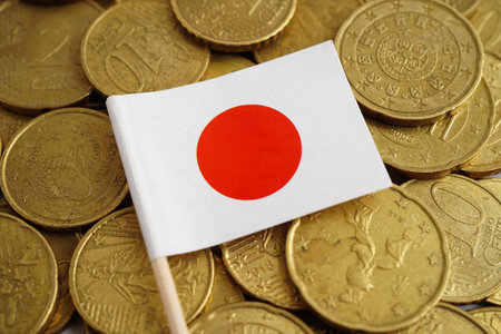 Japan flag on coin and banknote money, finance trading investment business currency.の写真素材