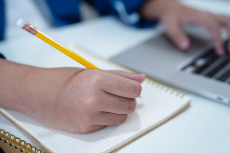 Teenage using tablet for communication, search data internet website to learn.