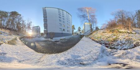 360 VR - Sunny and snowy view of apartment building